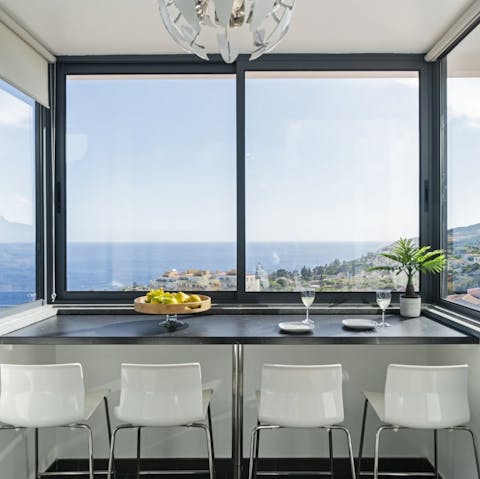 Take in spectacular views from the breakfast bar