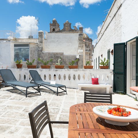 Take in the views over Ostuni from the roof terrace