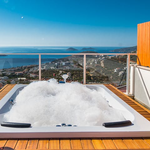 Unwind in the jacuzzi on the home's roof terrace