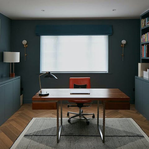 Host meetings and answer emails  in the home office space