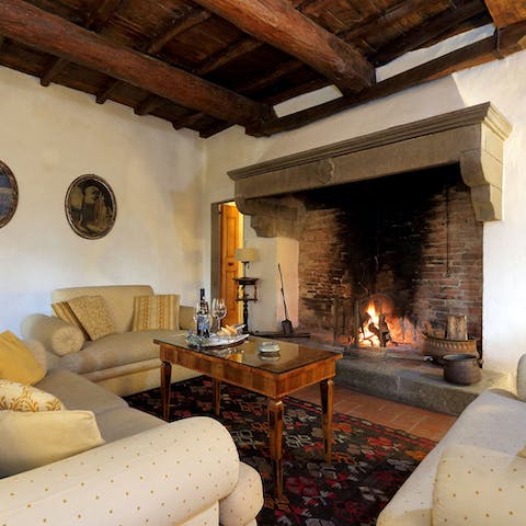 Soak up the rustic atmosphere by the crackling fire