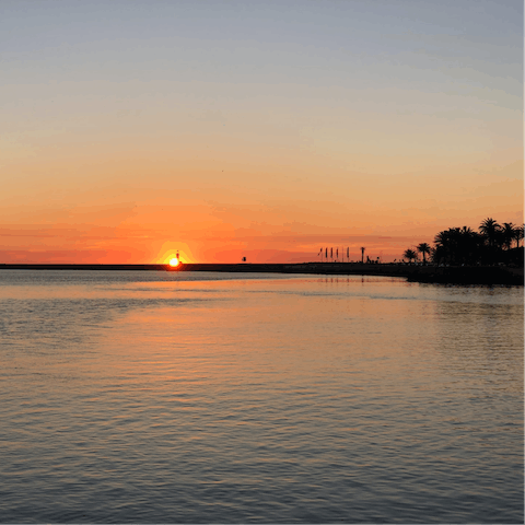 Enjoy a sunset stroll on Pastoras Beach, a four-minute walk away