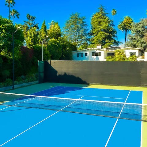 Challenge your loved ones to a game of tennis in the back garden