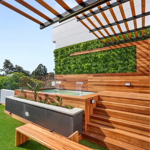 Soak away any stress in the building's inviting rooftop plunge pool