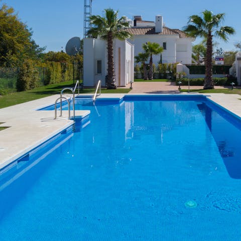 Go for a dip in the large communal pool