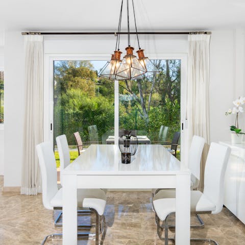 Gather in the stylish, sleek dining area