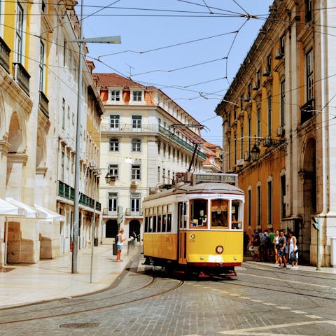 Hop on the iconic Tram 28, a three-minute stroll away and explore Lisbon