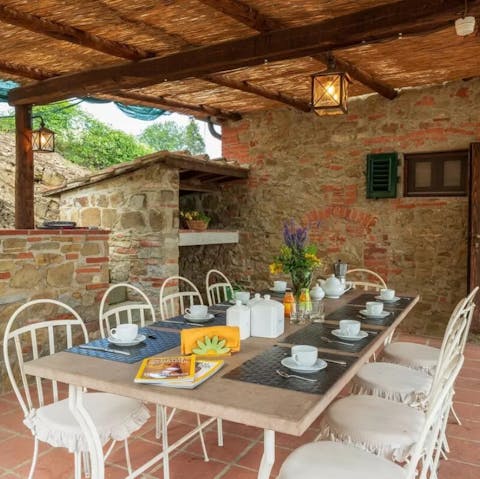 Gather on the covered terrace to tuck into tasty feasts