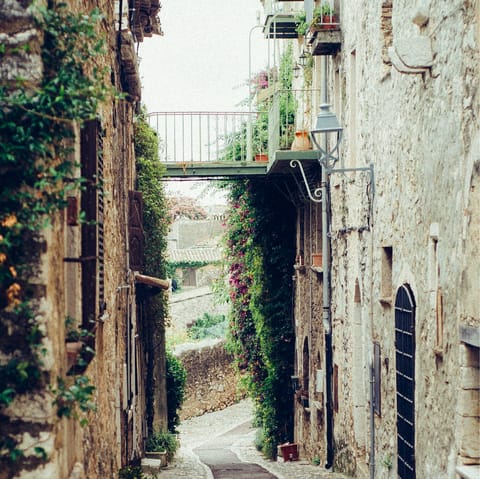 Explore the narrow streets of nearby San Donato in Poggia