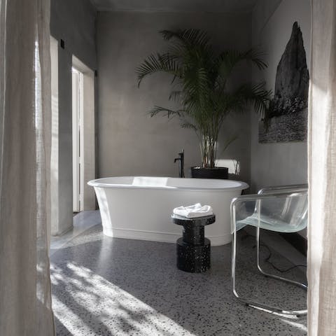 End the day in the glorious free-standing tub in the marble bathroom