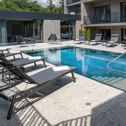 Take a dip in the pool or relax on the comfy sun loungers
