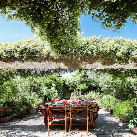 Spend balmy summer evenings dining alfresco on the beautiful garden terrace