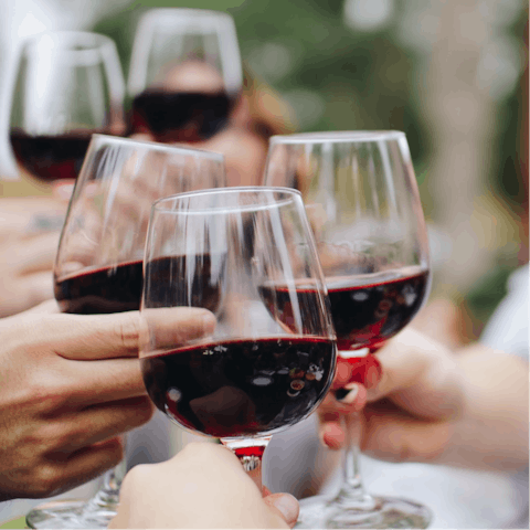 Share a bottle of wine over dinner at the many delicious eateries nearby
