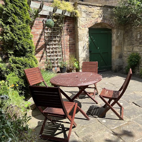 Enjoy a glass of bubbly or a celebratory alfresco meal in the private courtyard