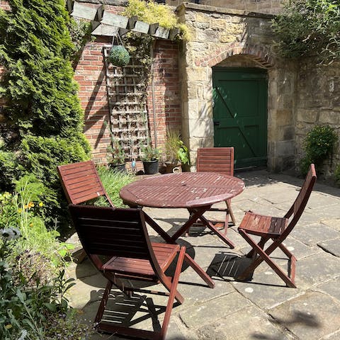 Enjoy a glass of bubbly or a celebratory alfresco meal in the private courtyard