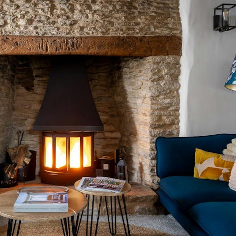 Relax by the wood burner after a walk to Meysey Hampton's pub