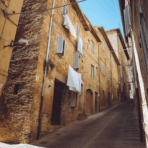 Explore ancient hilltop towns, including the cultural hotspot of Urbino, just under 50km away