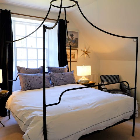 Sleep like nobility in the Italianate canopy bed