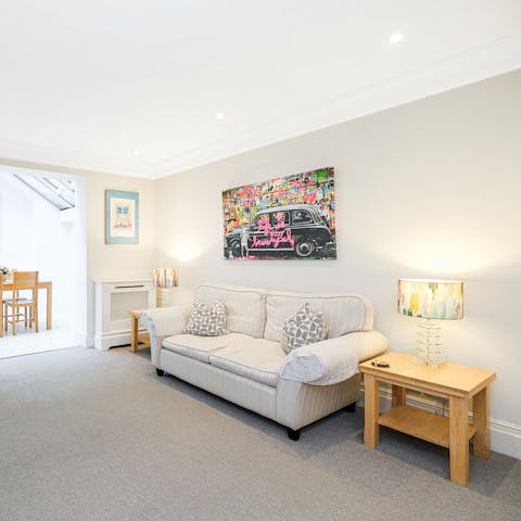 Wind down in the open plan living area with a family film or a good book