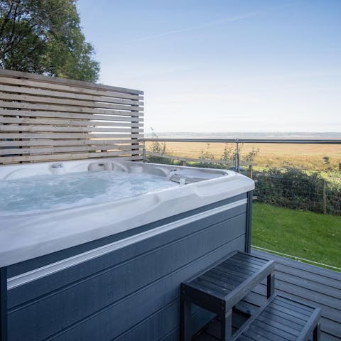 Soak in the views from the warming comfort of your private hot tub