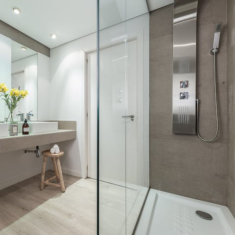Start mornings with a luxurious soak under the bathroom's rainfall shower