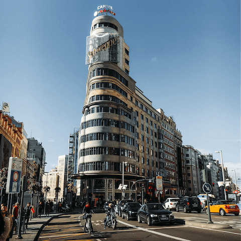 Treat yourself to some retail therapy along Gran Vía, fourteen minutes away on foot