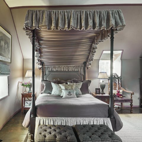 Enjoy a restful night in one of the four poster oak beds