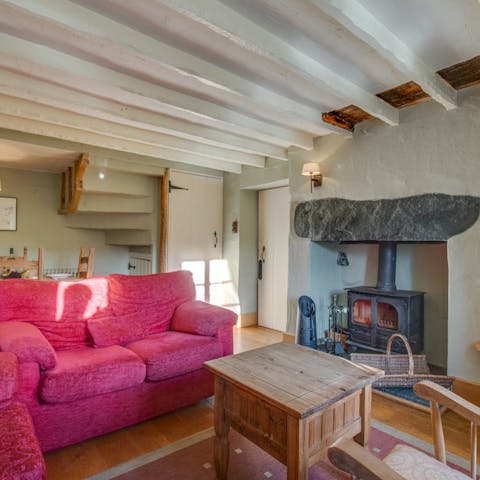 Warm up by the wood-burning stove on chilly evenings