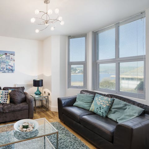 Settle down on the sofa to plan your day in South Devon with sea views as your backdrop