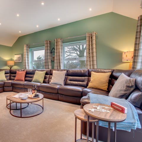 Get the gang together for family games night on the biggest sofa you've ever seen