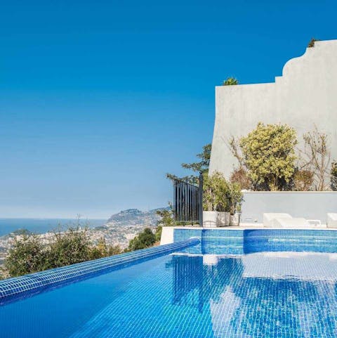 Swim in the gorgeous private infinity pool while admiring views of the ocean