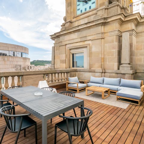 Have some cava on the stylish terrace at sunset