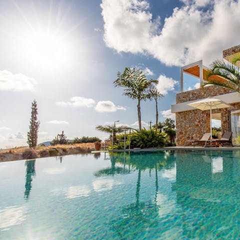 Cool off from the Greek heat with a swim in the private pool