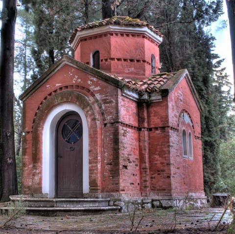 Stumble upon the estate's church as you explore the scented pine forest
