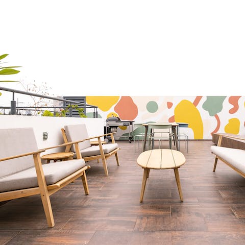 Relax on the rooftop terrace with its ample seating and barbecue grill