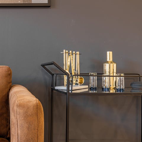 Mix yourself a cocktail with the stylish drinks cart