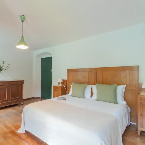 Sink into a deep slumber in the serene bedroom