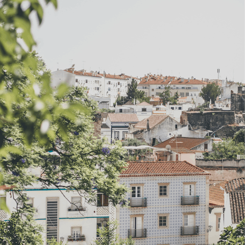 Stay in a hillside home, only a fifteen-minute stroll from the historic city of Tavira