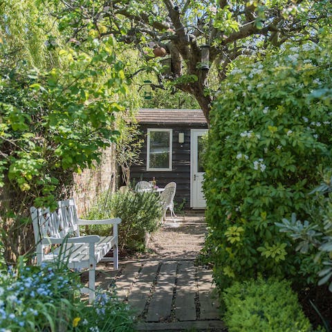 Sit out and enjoy a moment of quiet reflection in the tranquil cottage garden
