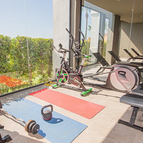 Visit the communal gym, well-equipped with weights, mats and machines