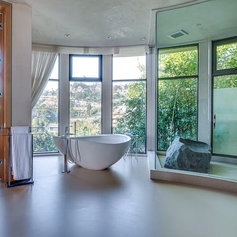 Pamper yourselves in the impressive spa-like bathrooms 