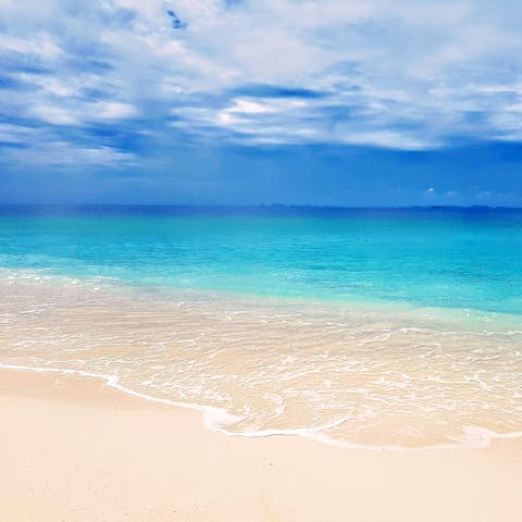 Marvel at crystal clear water – Laem Ga beach is a short walk away