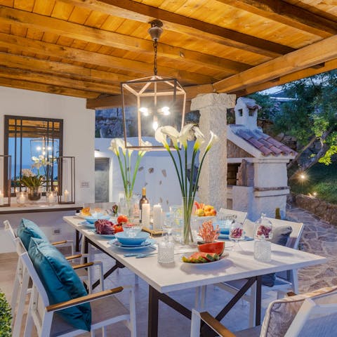 Embrace indoor-outdoor living with a barbecue on the covered terrace