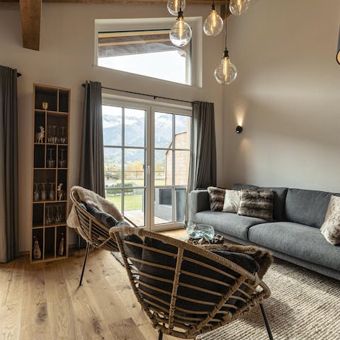 Enjoy Alpine mountain views from the comfort of the sofa