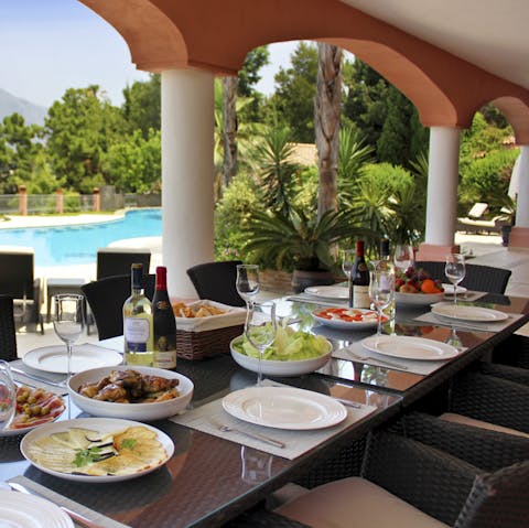 Enjoy lavish banquets cooked by a private chef on the shady verandah