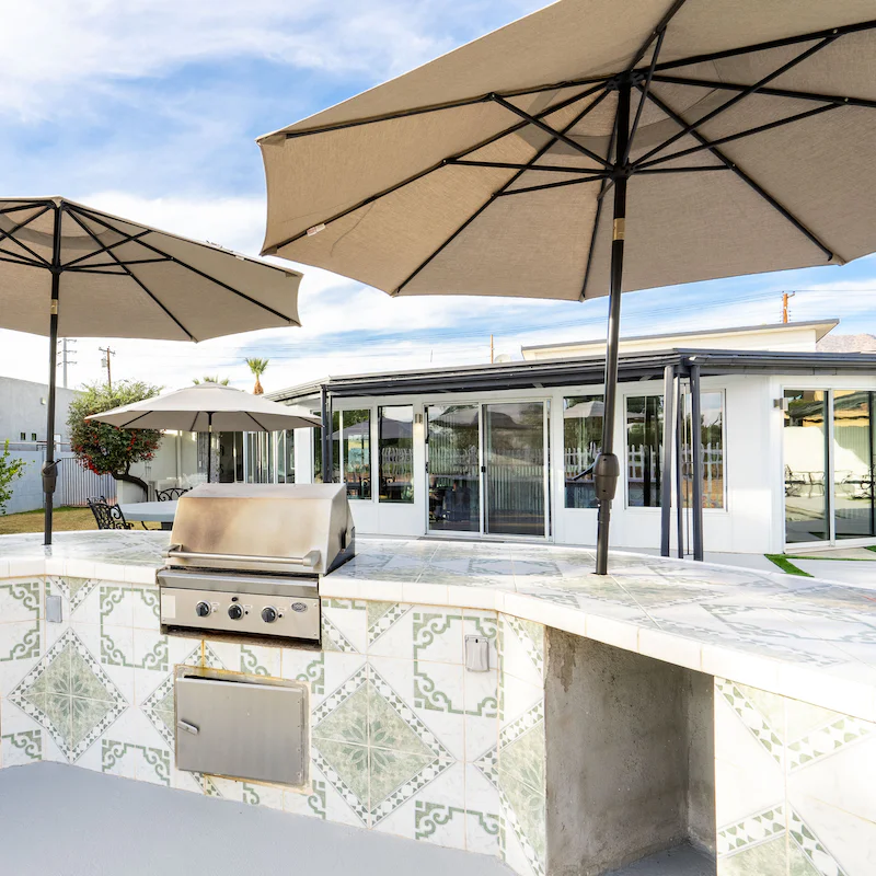 Fire up the barbecue in the open-air kitchen