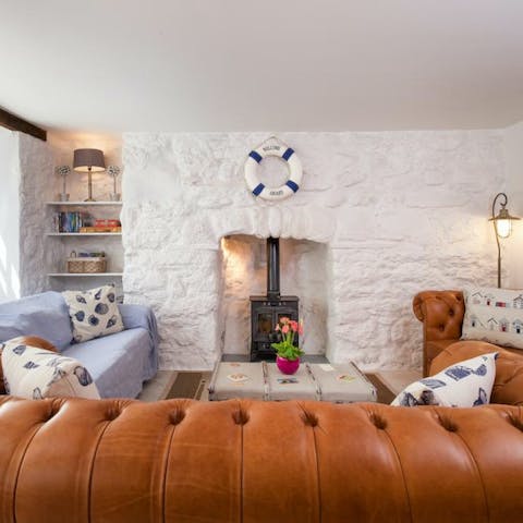 Snuggle up on the sofa as evening settles in and allow the log burner to toast your toes