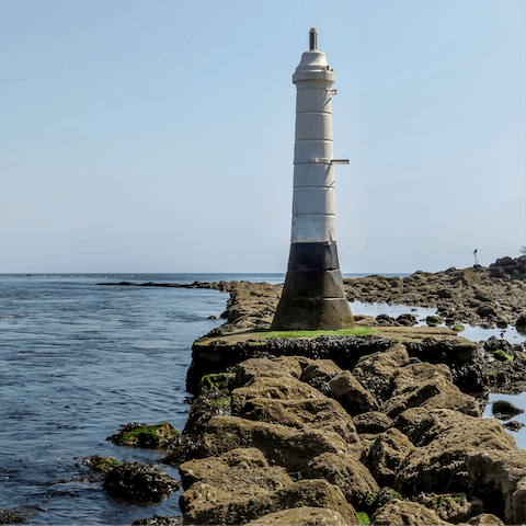 Take a stroll along the Devon coast and pay a visit to Shaldon's famous lighthouse 