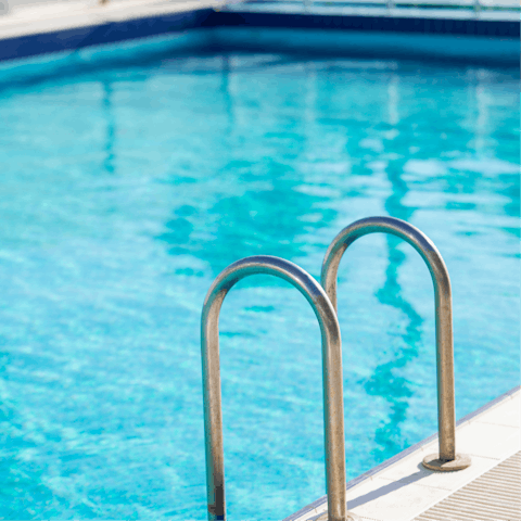 Soak up the sunshine by the communal pool – there's even a separate pool for kids 