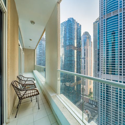 Greet the day with a cup of Arabic coffee on the balcony and admire the morning sun glinting off the high-rise buildings